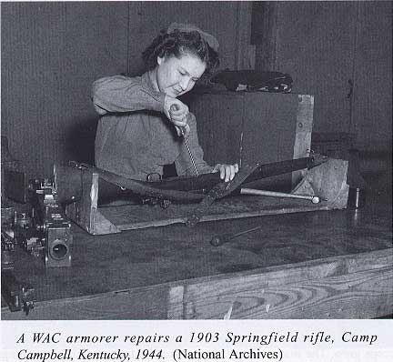 A WAC armorer repairs a 1903 Springfield rifle, Camp Campbell, Kentucky, 1944. (National Archives)