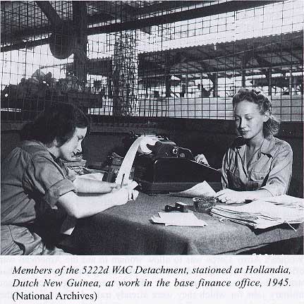 Members of the 5222d WAC Detachment, stationed at Hollandia Dutch New Guinea, at work in the base finance office, 1945.  (National Archives)